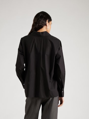 DRYKORN - Blusa 'CLOELIA' en negro