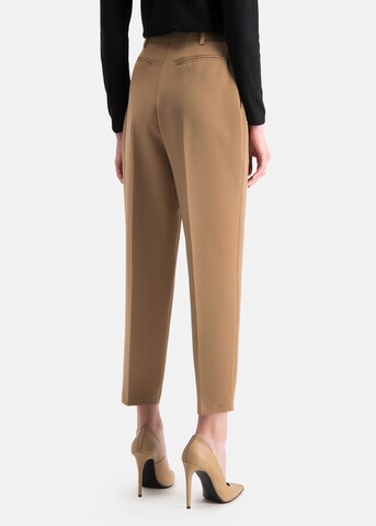 Nicowa Loose fit Pants in Beige