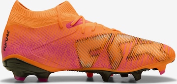 Chaussure de foot PUMA en orange : devant