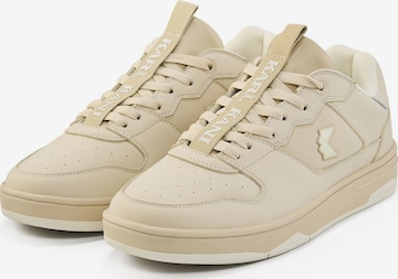 Baskets basses '89 2K' Karl Kani en beige : devant