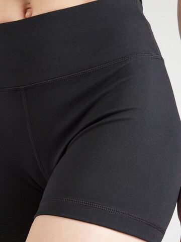Skinny Pantaloni sportivi di Champion Authentic Athletic Apparel in nero