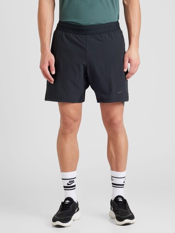 Regular Pantaloni sport 'FLEX REP 4.0' de la NIKE pe negru: față