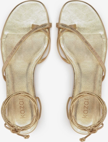 Sandalo di Kazar in oro