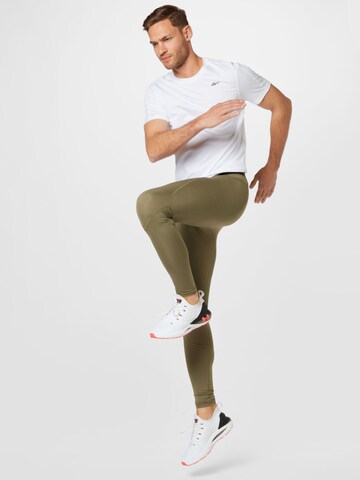 UNDER ARMOUR Skinny Sporthose 'Rush' in Grün