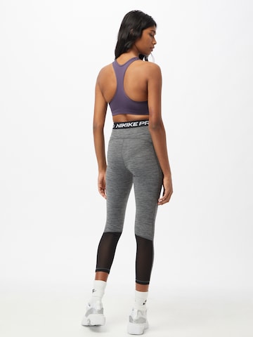 NIKE Skinny Sporthose in Grau