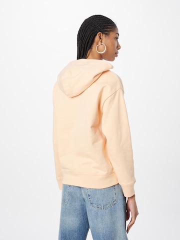 LEVI'S ® Sweatshirt 'Graphic Standard Hoodie' in Oranje