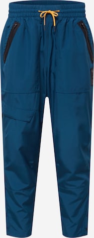 Loosefit Pantalon de sport 'First Mile' PUMA en bleu : devant