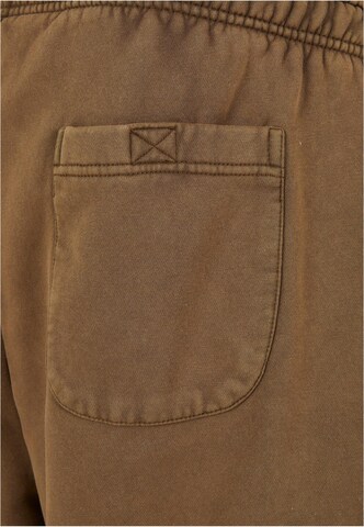 Urban Classics Loose fit Cargo Pants in Brown