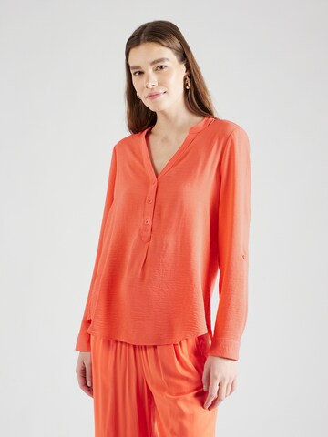 QS Blus i orange: framsida