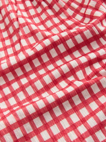 Next Overall värissä punainen