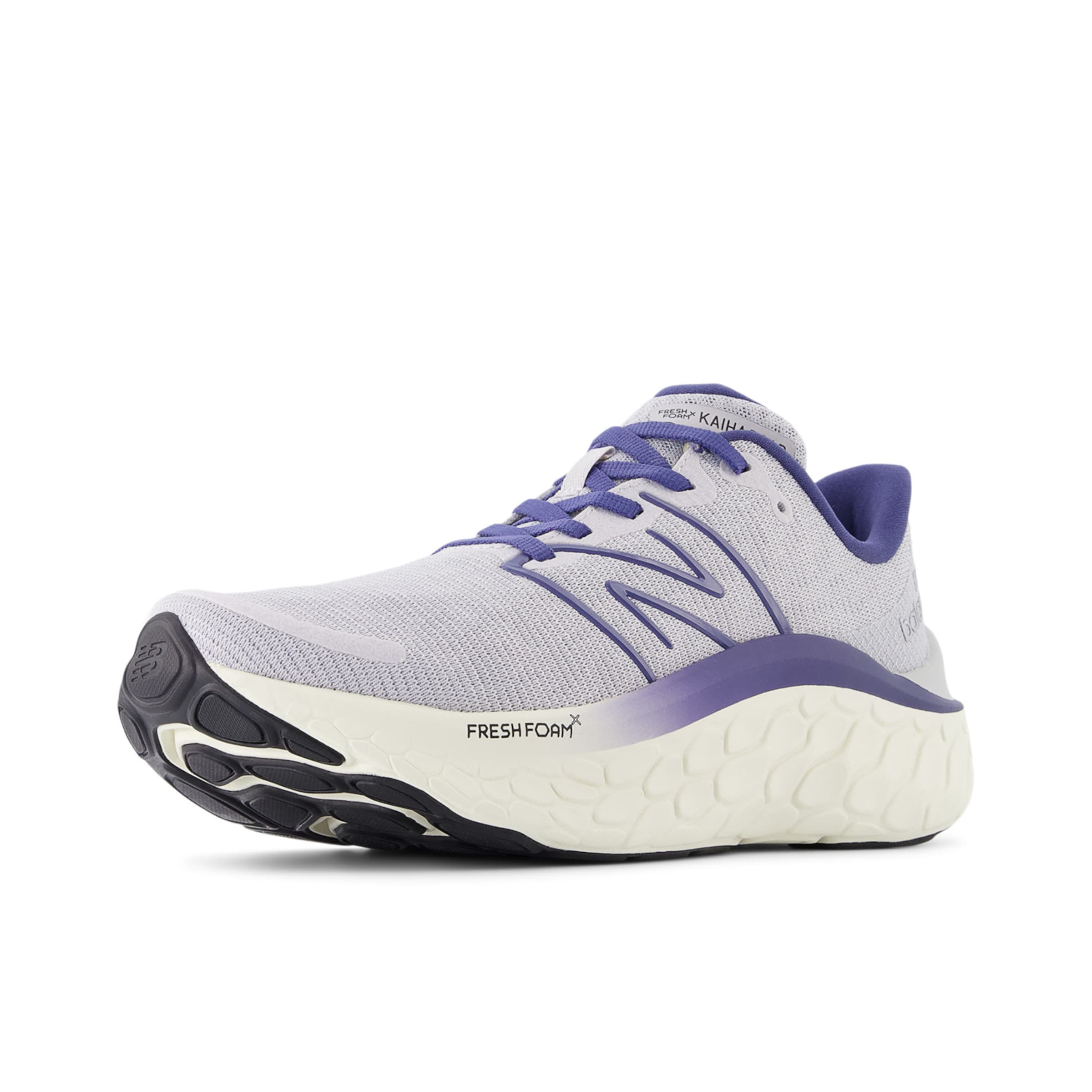 Chaussure de course new balance en violet : devant