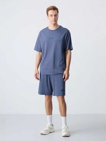 Survêtement Tommy Life en bleu : devant