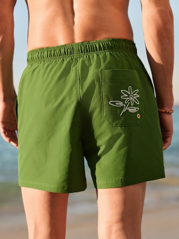 žalia Next Maudymosi trumpikės