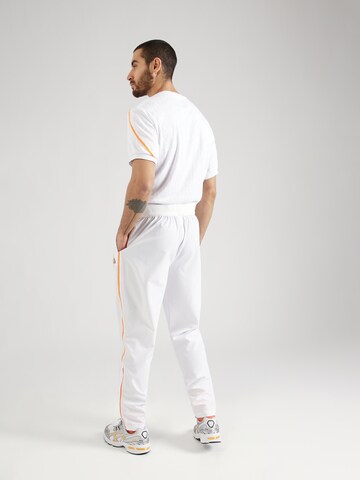 ELLESSE Normalny krój Spodnie sportowe 'Seaton' w kolorze biały