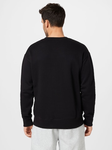 Champion Authentic Athletic Apparel Sweatshirt i svart