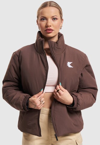 Karl Kani Between-Season Jacket in Brown: front