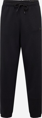 ALPHA INDUSTRIES Tapered Broek 'Essentials' in Zwart: voorkant