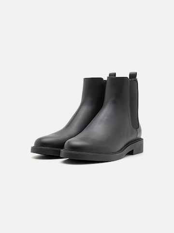 MICHAEL Michael Kors Chelsea-saapad 'HAZEL', värv must