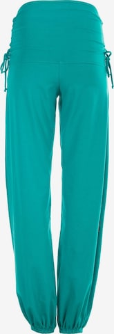 Winshape Ozke Športne hlače 'WH1' | zelena barva