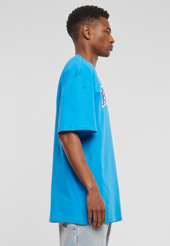 Karl Kani T-Shirt 'Originator' in Blau