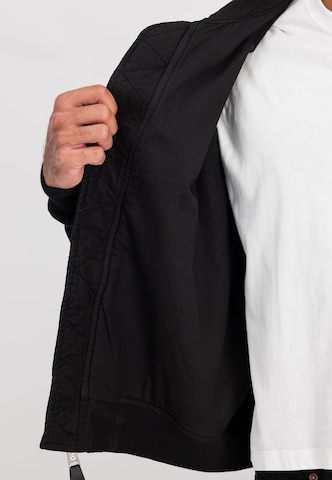 ALPHA INDUSTRIES Átmeneti dzseki 'CWU-36/P' - fekete
