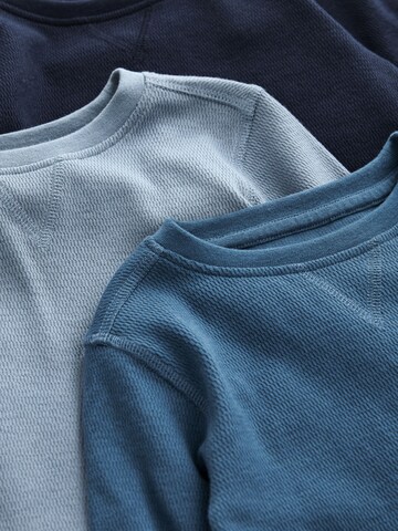 T-Shirt Next en bleu