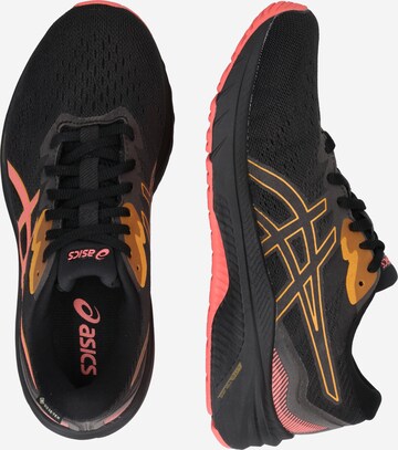 Scarpa da corsa di ASICS in nero