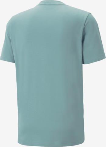PUMA Toiminnallinen paita 'ELEVATED' värissä harmaa