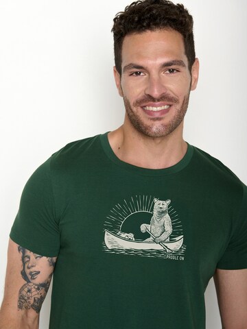 GREENBOMB T-Shirt 'Guide Bear Canoe' in Grün