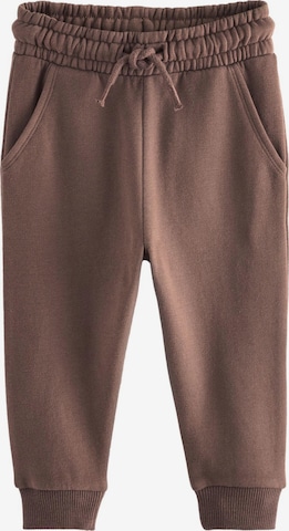 Next Trousers in Brown: front