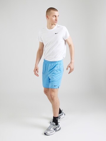 regular Pantaloni sportivi 'Totality' di NIKE in blu