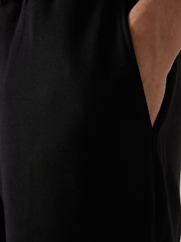 Regular Pantalon Tommy Life en noir