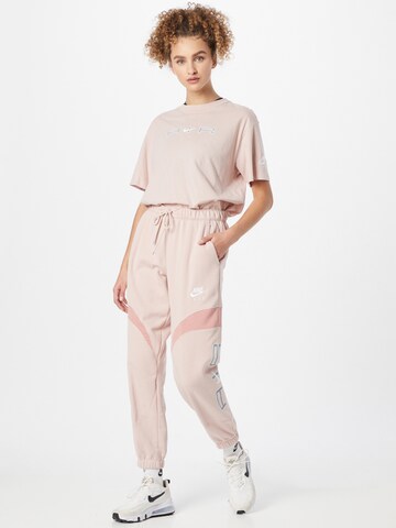 Nike Sportswear Tapered Pants in Pink