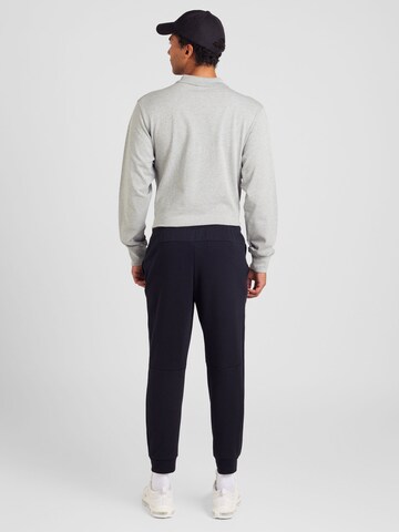 NIKE Tapered Sportsbukser 'PRIMARY' i sort