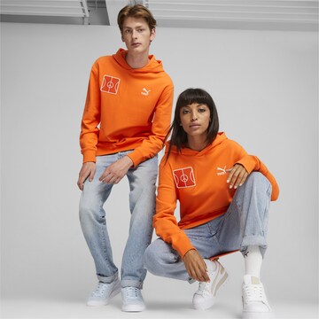PUMA Sportsweatshirt 'Icons of Unity’ in Orange