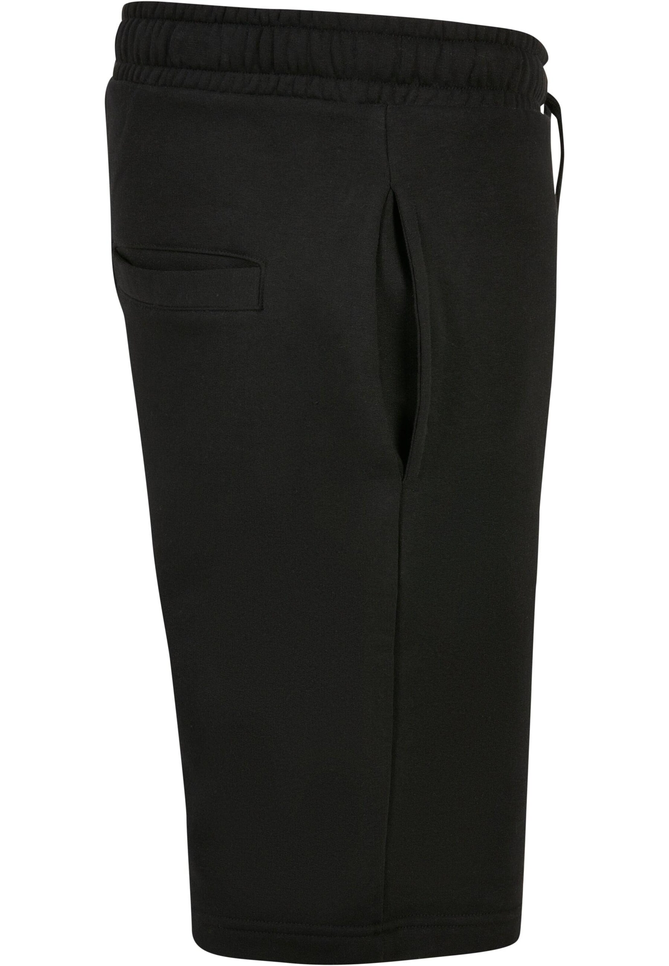 Karl Kani Regular Trousers in Black