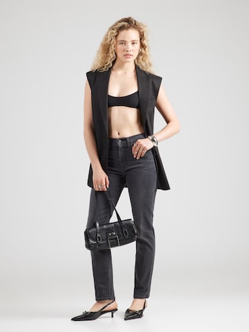 LEVI'S ® Slimfit Jeans '724' in Zwart
