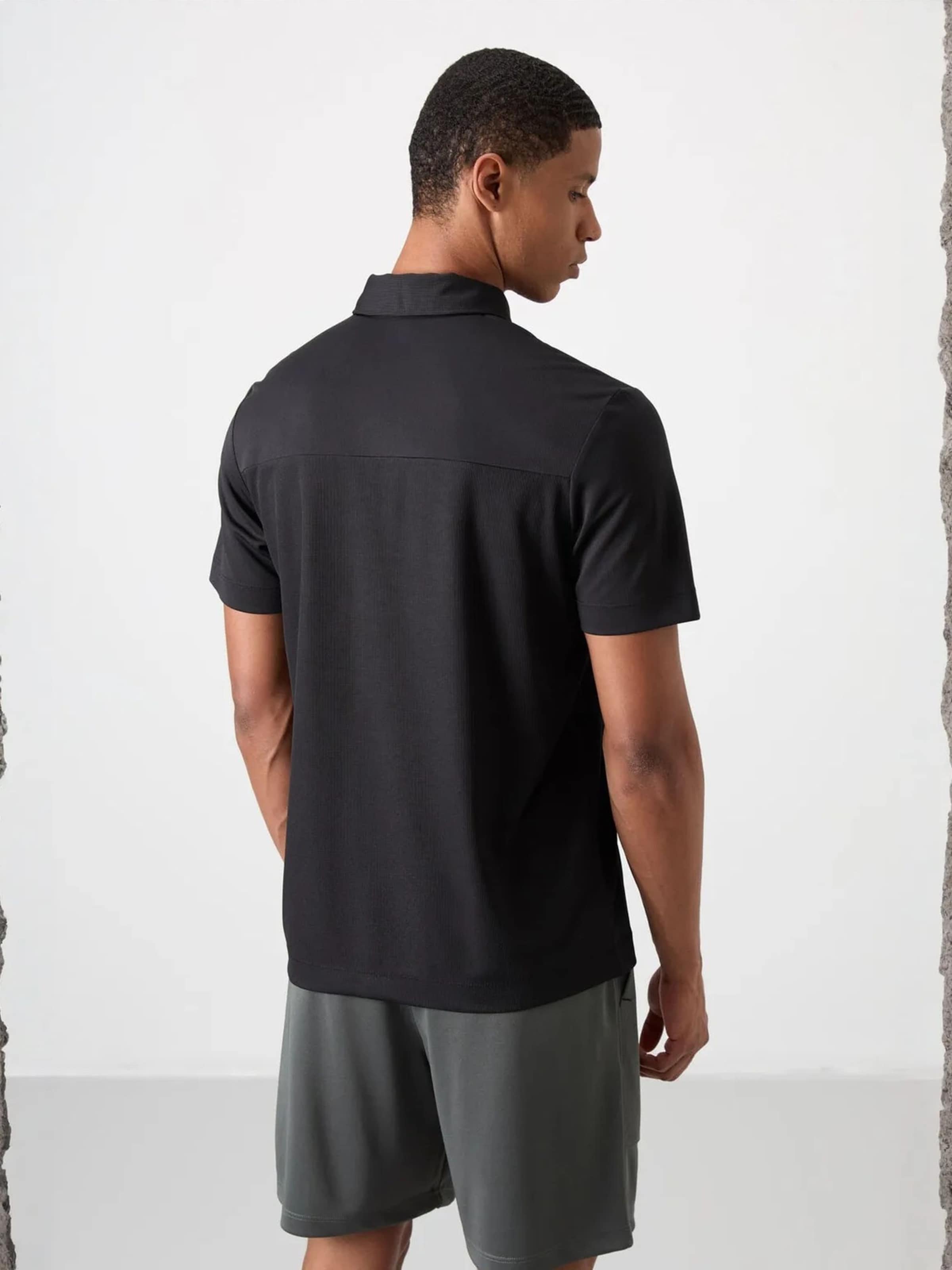 T-Shirt fonctionnel Tommy Life en noir