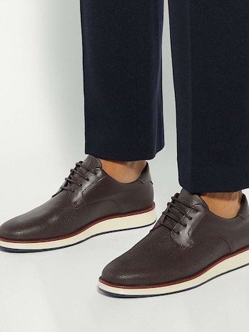 Dune LONDON Sportieve veterschoen 'Bow' in Bruin