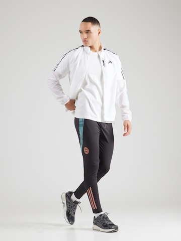 Tapered Pantaloni sport de la ADIDAS PERFORMANCE pe negru