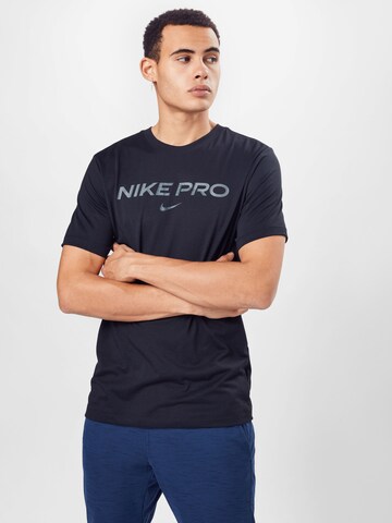 NIKE - Camiseta funcional en negro: frente