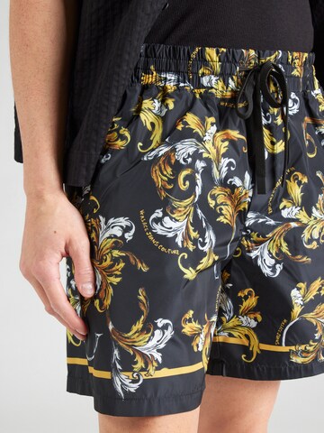 regular Pantaloni di Versace Jeans Couture in nero