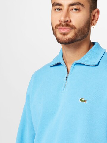 Sweat-shirt LACOSTE en blanc