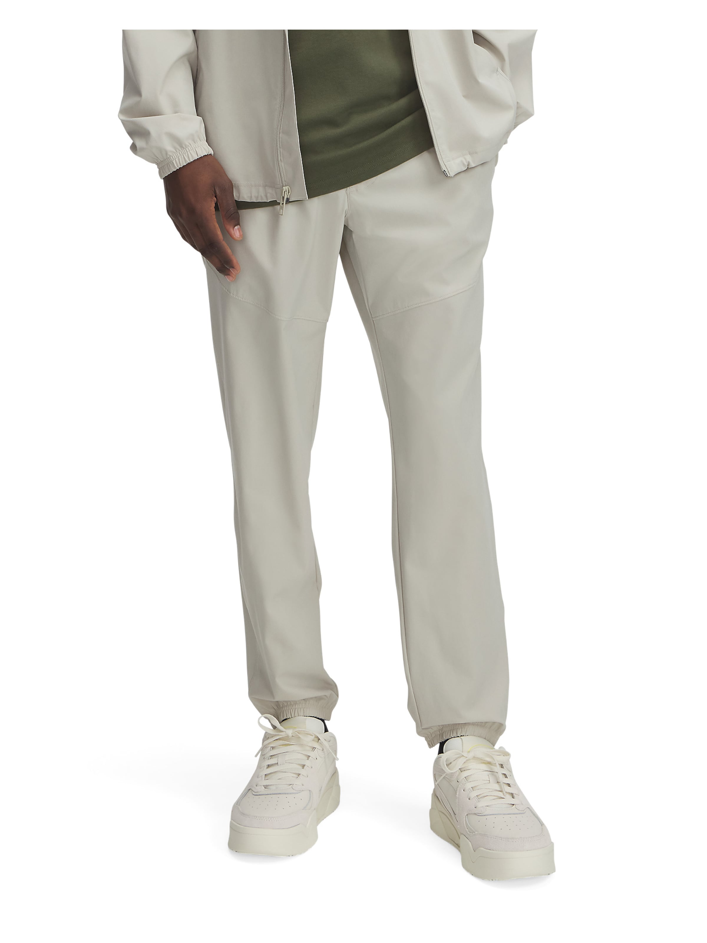 UNDER ARMOUR Tapered Sports trousers 'Vibe' in Green: front