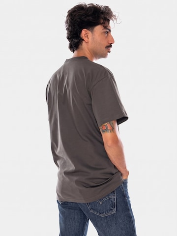 Maglietta 'S/S CHASE T-SHIRT SHUNGITE / GOLD' di Carhartt WIP in grigio
