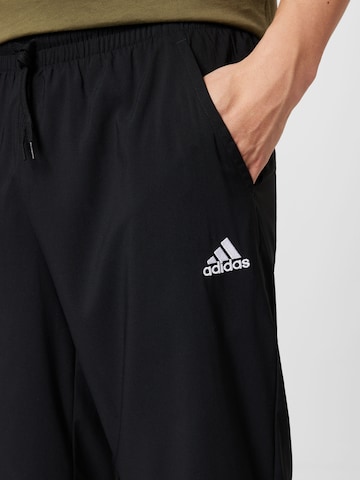 ADIDAS SPORTSWEAR Tapered Παντελόνι φόρμας 'Essentials Stanford' σε μαύρο