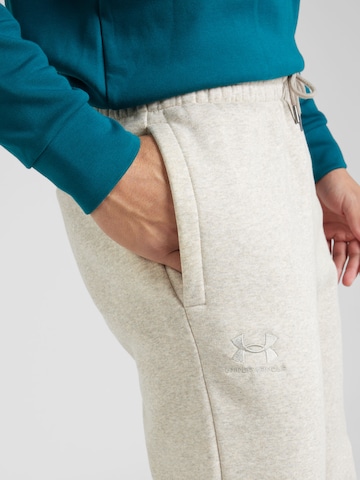 UNDER ARMOUR Tapered Workout Pants 'Essential' in Beige