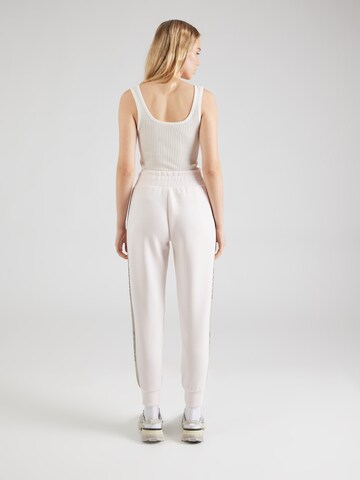 Tapered Pantaloni 'VICTOIRE' di GUESS in rosa