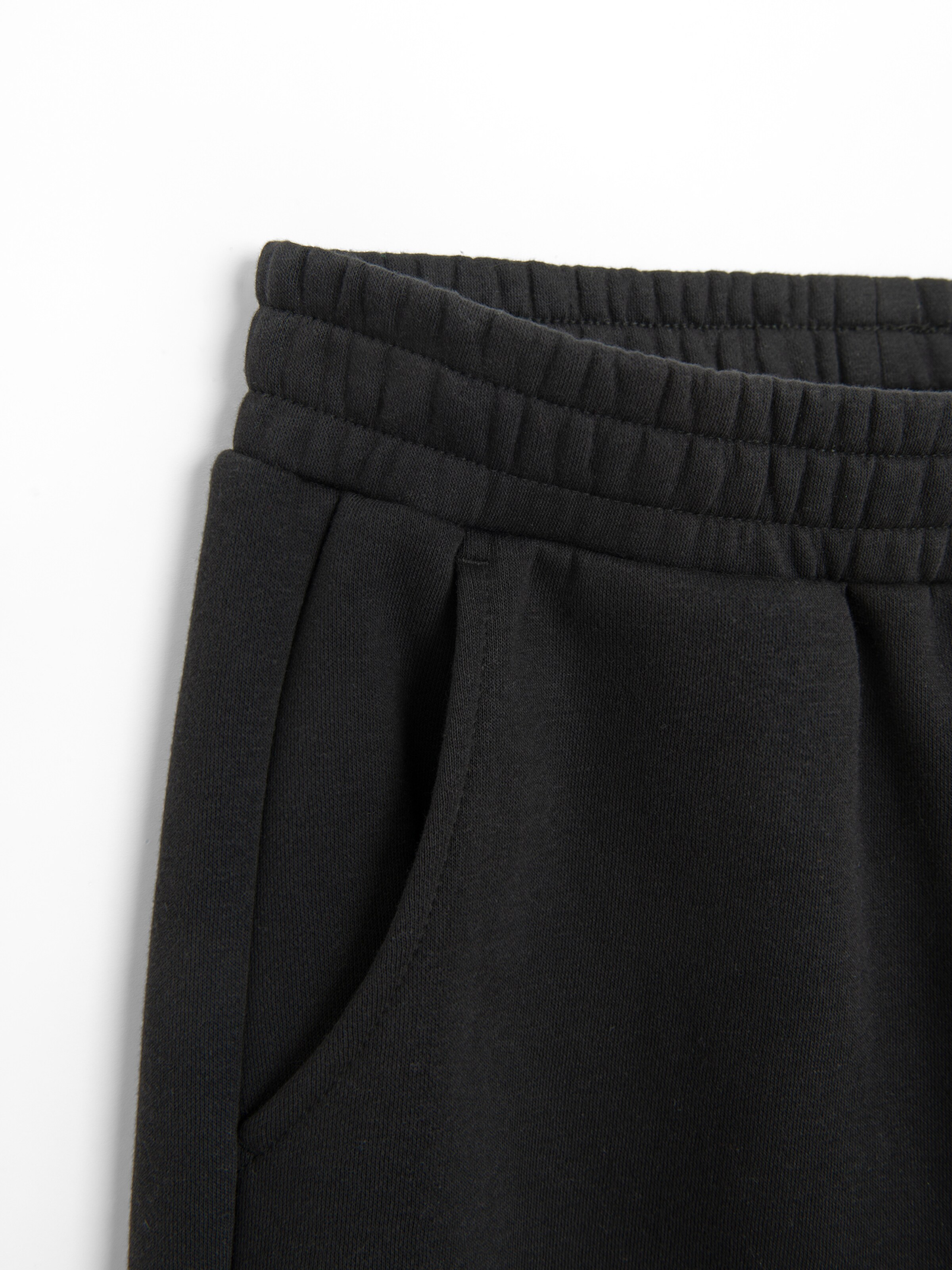 NoWear - Perna larga Calças em preto