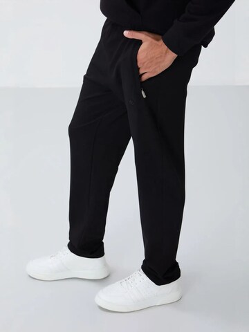 Tommy Life Kitsas Spordipüksid 'Jogginghose', värv must
